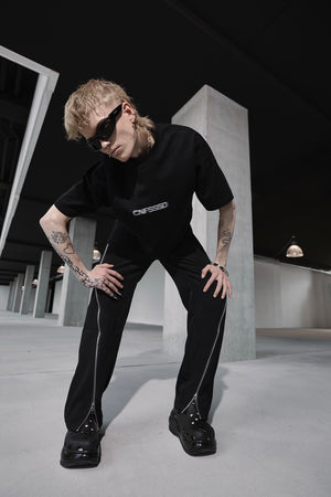 CNFSSSD ZIPPED FLARE TROUSERS