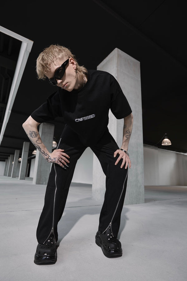 CNFSSSD ZIPPED FLARE TROUSERS